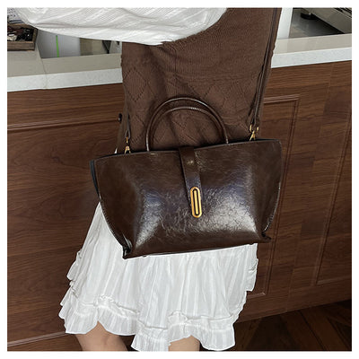 Bolso Bucket de Cuero Encerado Elegante y Portátil - Image 52