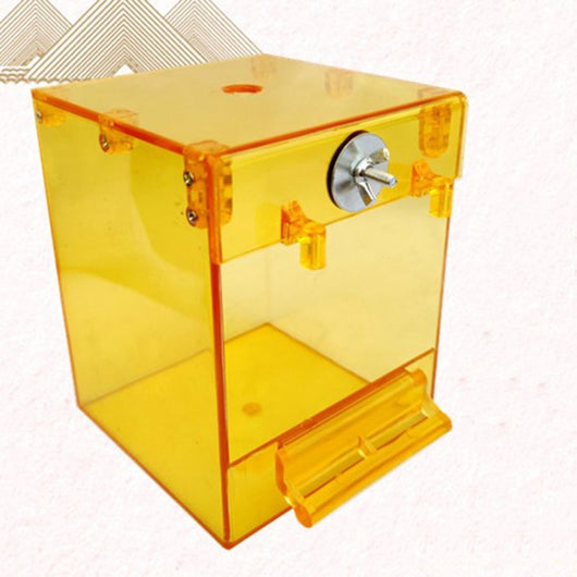 Transparent yellow square bird bath with a front perch and metal attachment for external cage mounting. - Image 6