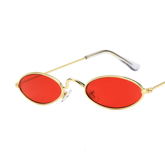 Retro oval frame sunglasses with vibrant red lenses and shiny gold-colored metal frames on a white background. - Image 4