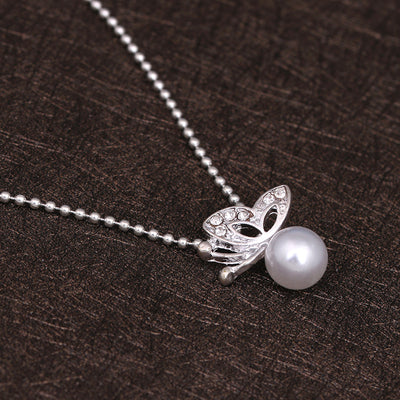 Conjunto de Aretes y Collar con Mariposa de Perla y Diamantes Completos - Image 5