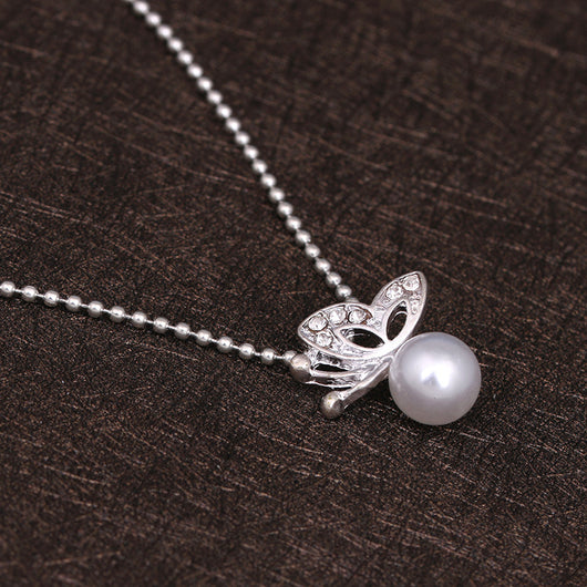 Conjunto de Aretes y Collar con Mariposa de Perla y Diamantes Completos - Image 5