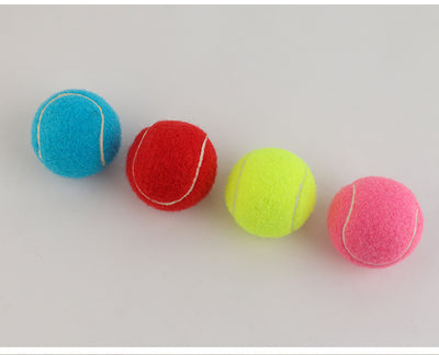 Pink rubber pet tennis ball, bite-resistant, for dogs to play fetch and chew. - Image 3