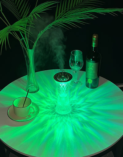 Rose gold and clear crystal-like desktop humidifier with a faceted body and an atmosphere lamp function. - Image 5