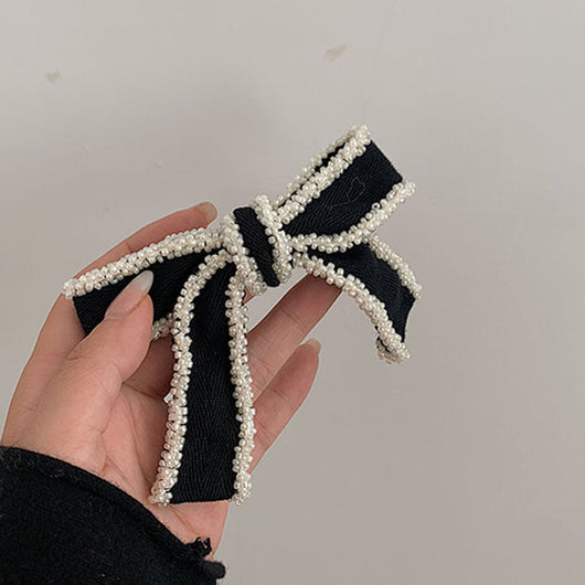 Diadema Elegante con Moño Blanco y Detalles Perlados - Image 10