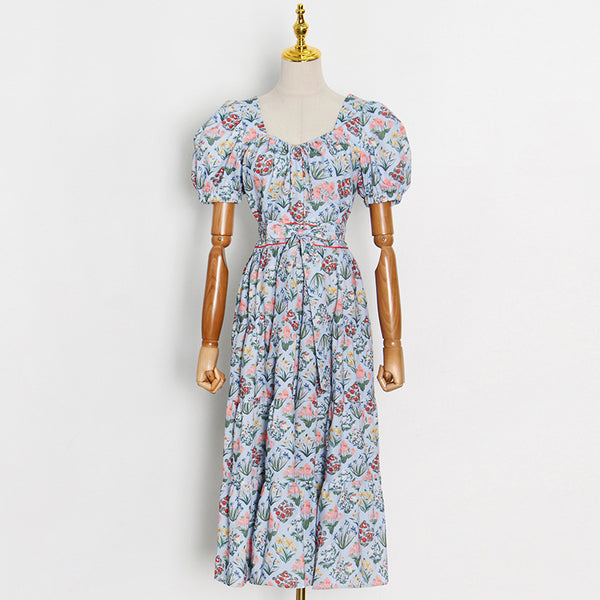 Vestido Azul Mori con Mangas Abullonadas, Cintura Alta y Estampado