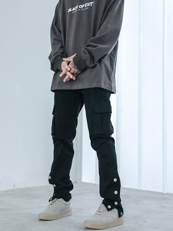 Pantalón Denim Negro Slim con Bota Abierta