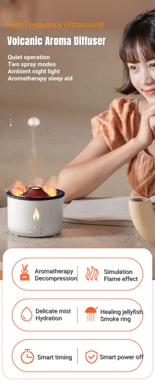 White ultrasonic essential oil diffuser with orange flame effect mist, alongside a gift set of Lavender, Peppermint, Tea Tree, and Sweet Orange essential oils. - Image 11