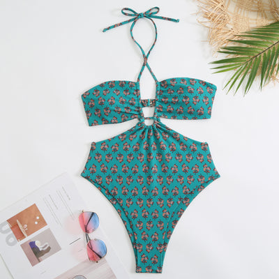 Dark green floral one-piece swimsuit with halter neck, bandeau top, cut-outs, and matching sheer sarong. - Image 15