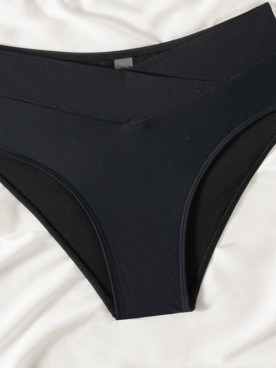 Black one-shoulder bikini with a gold-tone metal buckle detail and high-waisted bottoms with a V-front design. - Image 15