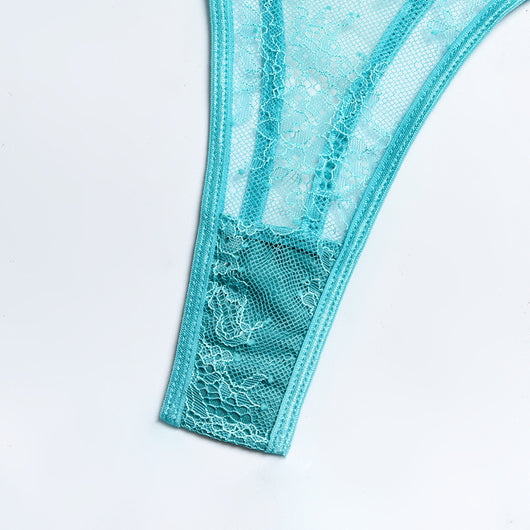 Mint green mesh and lace lingerie set with underwire bra, ruffled garter belt, and thong, displayed flat. - Image 12