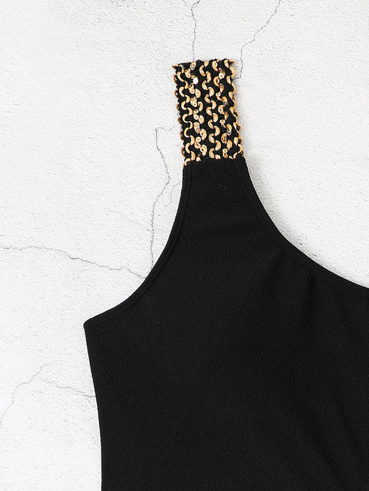 Black one-shoulder one-piece swimsuit with side cut-outs and gold chain-link detailing on strap and waist. - Image 16