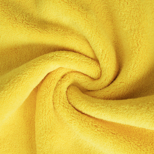 Yellow microfiber pet drying towel with black trim draped over a bathtub, with a golden retriever, poodle, and cat. - Image 9