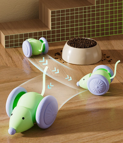 Green and purple electric mouse car cat toy with a glowing tail on a woven mat, designed for interactive play. - Image 21