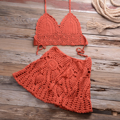Light beige crochet bikini set with a halter crop top and a matching open-knit mini skirt with tassels. - Image 30