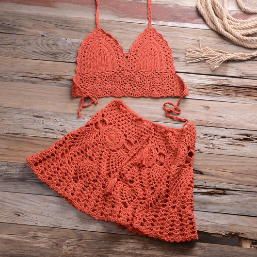 Light beige crochet bikini set with a halter crop top and a matching open-knit mini skirt with tassels. - Image 30