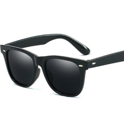 Black Wayfarer-style sunglasses with silver mirrored lenses and small gold accents on the frame. - Image 9