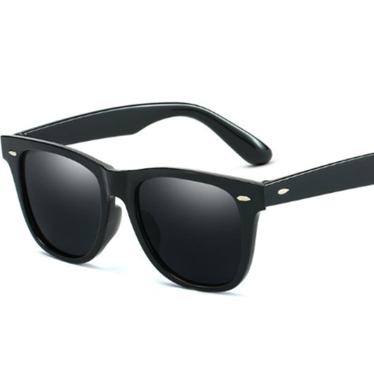 Black Wayfarer-style sunglasses with silver mirrored lenses and small gold accents on the frame. - Image 9