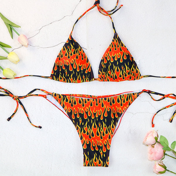 Flame print bikini swimsuit with a bandeau triangle top and tie-side split bottom in red, orange, yellow, and black. - Image 6