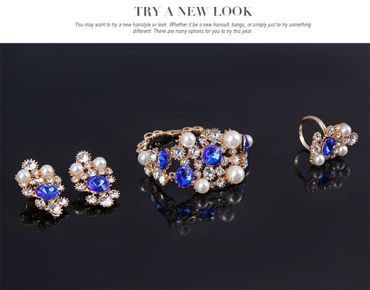 Four-piece bridal jewelry set with gold-toned necklace, earrings, bracelet, and ring, featuring amber and clear rhinestones with faux pearls. - Image 12