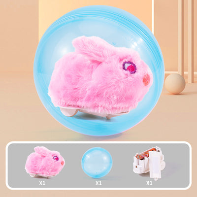Plush orange and white hamster toy on wheels inside a transparent pink rolling ball, with components shown. - Image 6