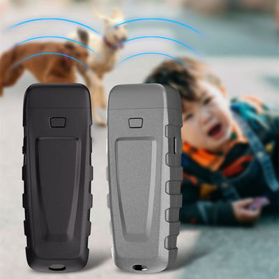 Black and orange handheld ultrasonic dog training device with a Type-C charging port and an orange button. - Image 4
