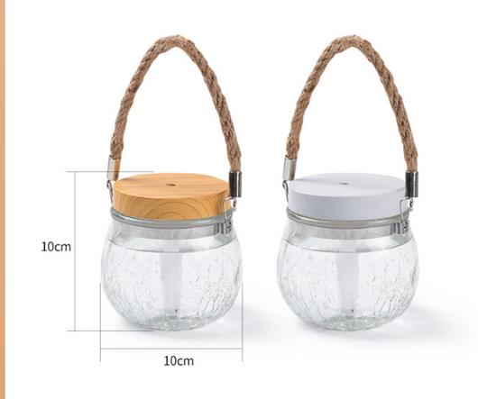 Desktop humidifier with a clear, crackled glass base, white lid, and a brown rope handle. - Image 8