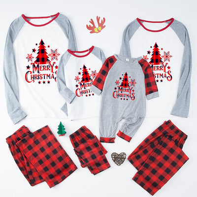 Family of four wearing matching red and black buffalo plaid Christmas pajamas with white and grey raglan tops. - Image 3
