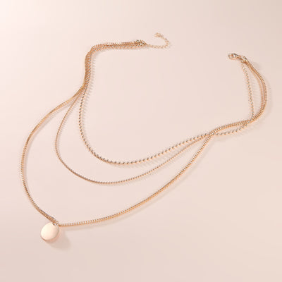 Collar Pendiente Multicapa con Discos Trendy - Image 5