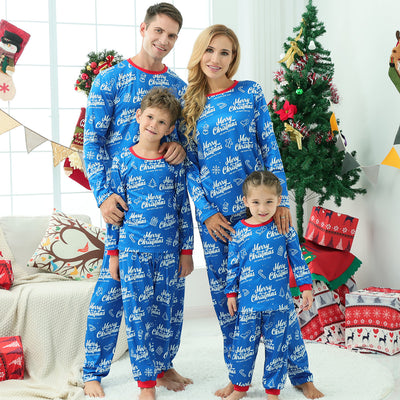 Family of four wearing matching green Christmas pajamas with snowman and Christmas tree print, red trim. - Image 10