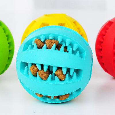 Teal rubber slow feeder dog toy ball with internal spikes for teeth cleaning and treat dispensing, 7cm size. - Image 26