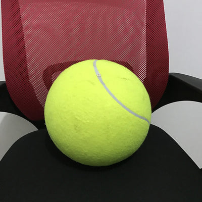 Giant yellow tennis ball with white seams for dogs, resting on a black office chair. - Image 9
