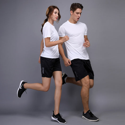 Smiling man wearing a black short sleeve crew neck t-shirt, ideal for sports and fitness activities. - Image 5