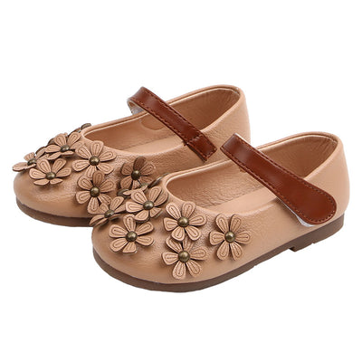 Black Mary Jane shoes for girls with 3D flower appliques on the toe and a brown hook-and-loop strap. - Image 8