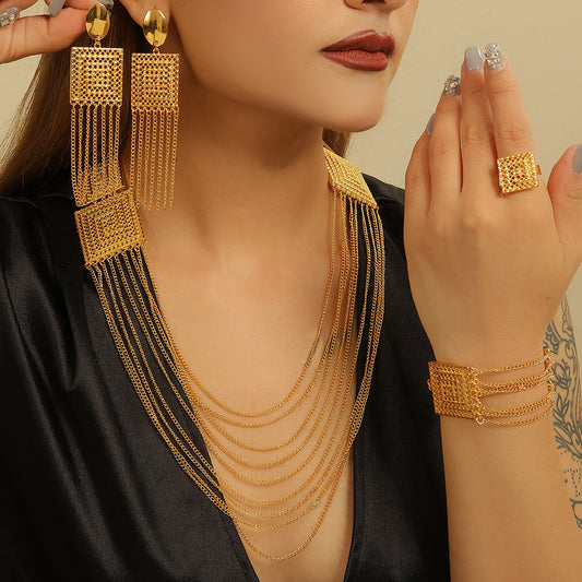 5-piece gold-plated jewelry set with multi-layered tassel necklace, matching dangle earrings, bracelet, and square ring. - Image 2