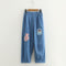 Pantalón Cropped Denim Patchwork Estilo Universitario con Bordado de Oso