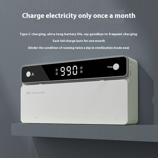 Black wall-mounted UVC toothbrush sterilizer with digital display, holding one manual and three electric toothbrushes. - Image 3