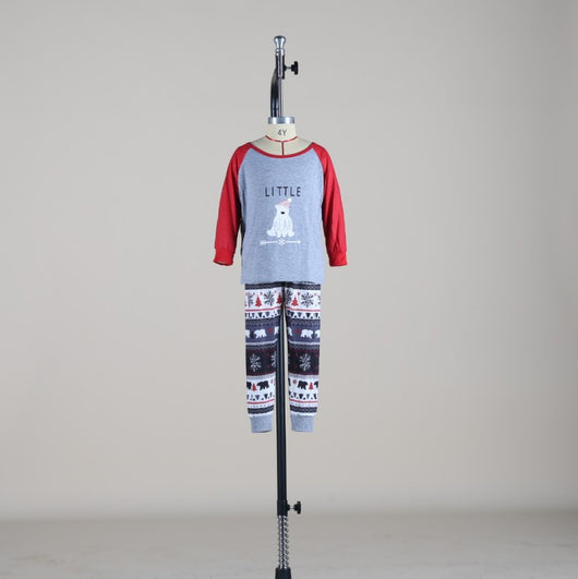 Child's Christmas pajama set with a grey 'LITTLE BEAR' top and red raglan sleeves, paired with patterned pants. - Image 2
