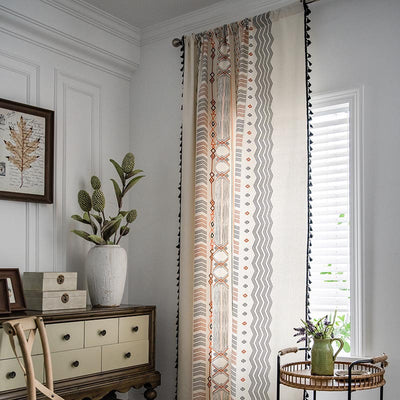 Boho cream cotton and linen curtain with tribal print in black and orange, featuring black fringe tassels. - Image 11