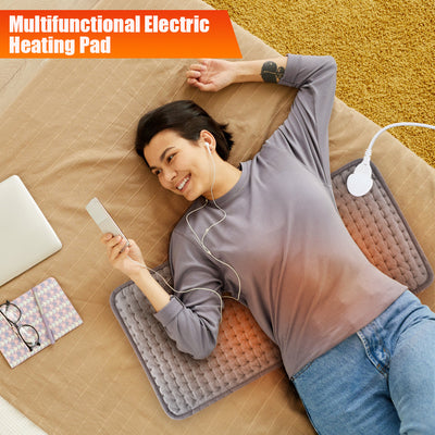 Gray quilted electric heating pad with a white wired controller and power plug, partially rolled up.