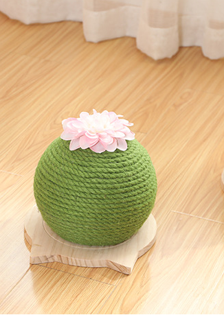 Green rope cat scratching toy shaped like a cactus with a pink flower on top, sitting on a light wood base. - Image 10
