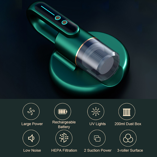 Dark blue handheld bed vacuum cleaner with clear dustbin, gold accents, and illuminated control panel on a charging base. - Image 22