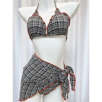 Woman in a retro plaid bikini three-piece set with a halter top, bikini bottom, and matching sarong skirt. - Image 11