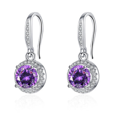 Aretes Moissanita Redondos de Cuatro Puntas - Image 10