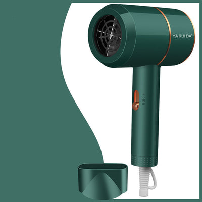 White portable folding hair dryer with rose gold accents and a nozzle attachment, shown with its base. - Image 8