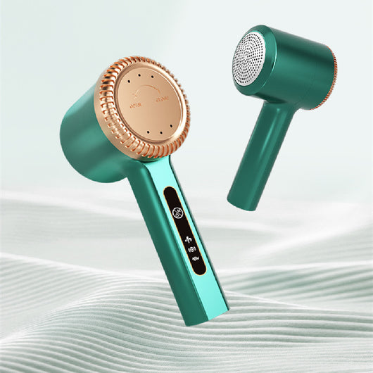 White electric lint remover with a perforated metal screen and a brown textured accent band.