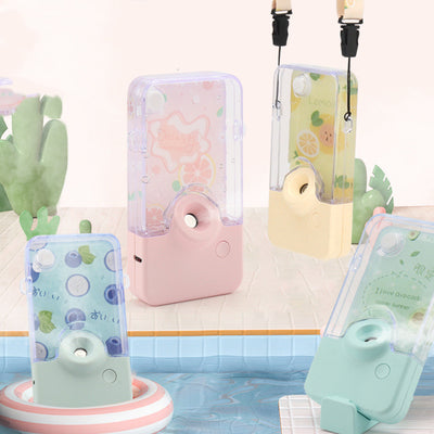 Pink and clear portable handheld humidifier with a fruit pattern, mist nozzle, and a matching pink neck lanyard.
