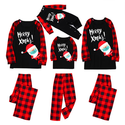Family matching Christmas pajamas with black tops, red plaid sleeves, and Santa wearing a mask, paired with red plaid pants. - Image 26