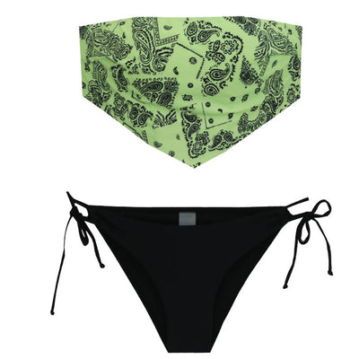 Lime green bandana print bandeau bikini top with black low-rise tie-side bottoms on a woman by a pool. - Image 5