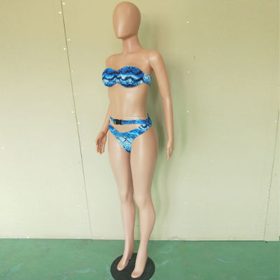 Woman in a purple and pink snakeskin print three-piece swimsuit with an off-shoulder crop top and high-waisted bottoms. - Image 21