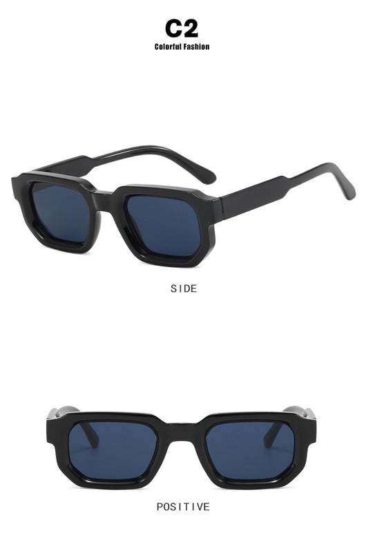 Black square-frame sunglasses with thick, angular frames and dark blue lenses, shown on a white background. - Image 19